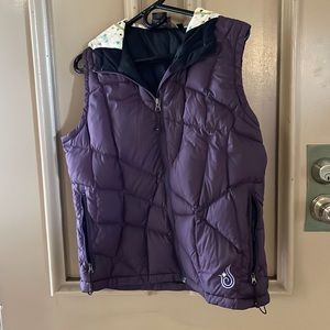 Insulated all weather vest with hood